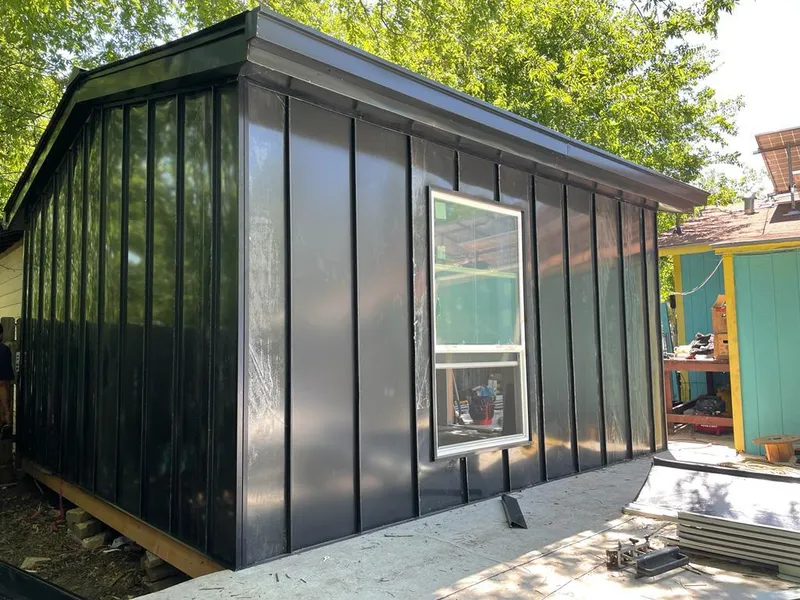 Black standing seam metal wall panels for Roof Inspection in Prattville